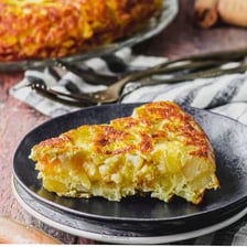 A frittata and a Spanish tortilla shown as omelet-style egg dishes