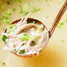 A pot of clear culinary stock used as a soup base.