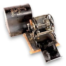 A vintage mimeograph machine used to make paper copies
