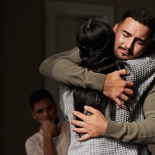 A person offering calm and gentle comfort