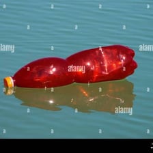 An object resting on the surface of calm water.