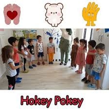 People performing the Hokey Pokey in a circle