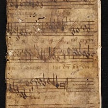 Incomplete manuscript pages preserved in separate fragments