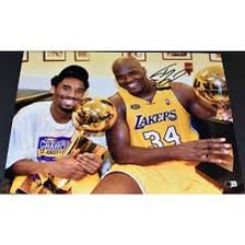 Shaquille O’Neal and Kobe Bryant in Los Angeles Lakers uniforms.