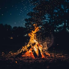 Bright flames blazing against a dark background