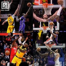 A basketball player completing a powerful dunk over a defending player.