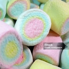 Soft marshmallows showing their puffy, cushion-like texture.