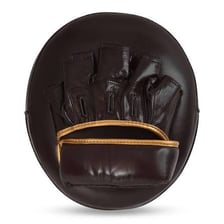 A boxing glove striking a padded training mitt.