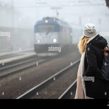 A traveler arriving at a train station