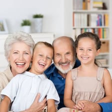A grandfather spending time with a grandchild