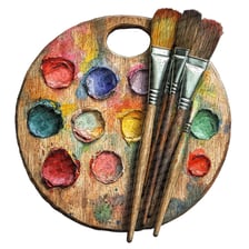 A watercolor painting beside a palette and brushes.