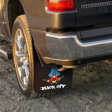 A vehicle mudflap decorated with an image of Yosemite Sam