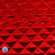 Layers of quilted fabric provide soft cushioning around delicate items.