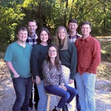 Seven siblings born as septuplets pictured together.