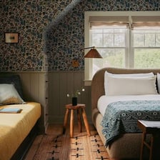 A bedroom interior centered on a bed.