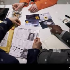 An investigator studying documents closely