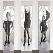 A reflection visibly warped by a funhouse mirror.