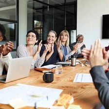 A group of coworkers collaborating around a table