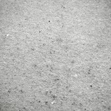 A mostly smooth surface with a small amount of visible texture