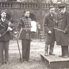 John Philip Sousa conducting a marching band.