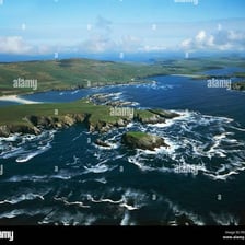 Aerial view of the rugged coastline and islands of Shetland, Scotland.