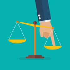 An illustration of uneven justice scales representing unfair treatment.