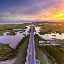 A car traveling along an open highway