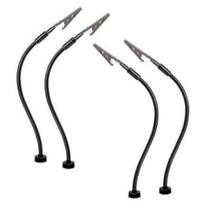 Hands pulling two connected metal clips apart.