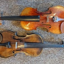 A fiddle, or violin, shown as the instrument in the expression “fit as a fiddle.”