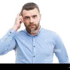 A person touching the top of their head