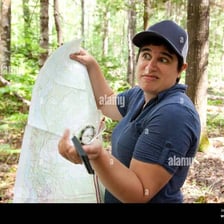 A person studying a map to become familiar with an unfamiliar place