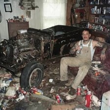A mechanic repairing a vehicle