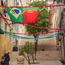 A Lisbon street scene in Portugal, representing Portuguese origin.