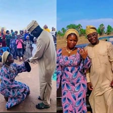 A person kneeling while making a marriage proposal.
