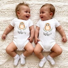 Two people dressed in coordinated matching clothing.