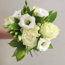 A small hand-tied bouquet of flowers