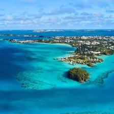 Aerial view of Bermuda’s islands surrounded by turquoise Atlantic water.