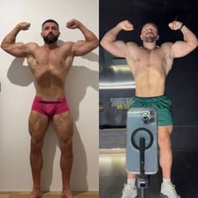 A muscular person lifting weights in a gym.