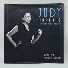 Portraits of author Judy Blume and entertainer Judy Garland, both named Judy