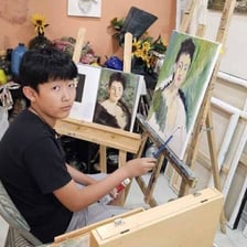 An artist painting in imitation of another painter’s style.