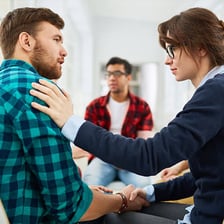 Two people communicating directly face to face