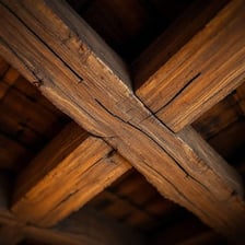 A wooden crossbeam used as a structural support.