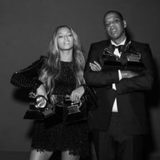 A Grammy Award trophy representing the music honors associated with Beyoncé and Jay-Z.