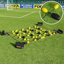 A goalkeeper changing the direction of a soccer ball.
