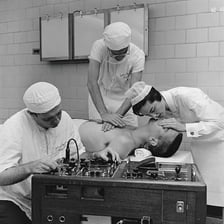 A medical team performing resuscitation on a patient
