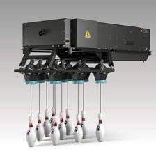 An automatic bowling machine that clears and resets the pins