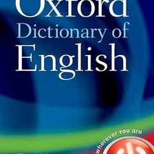 An open dictionary displaying word definitions.