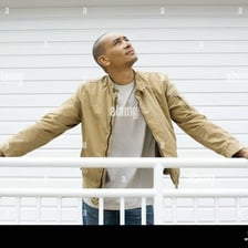 A person gripping a handrail for support