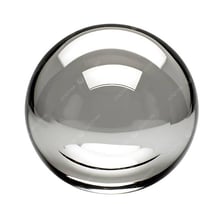 A polished silver object shining in the light