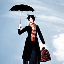 Mary Poppins holding her umbrella in the film.